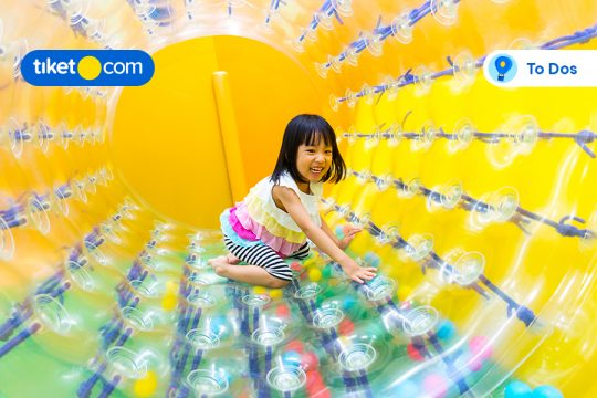 A kid is playing in a Playground in Jakarta