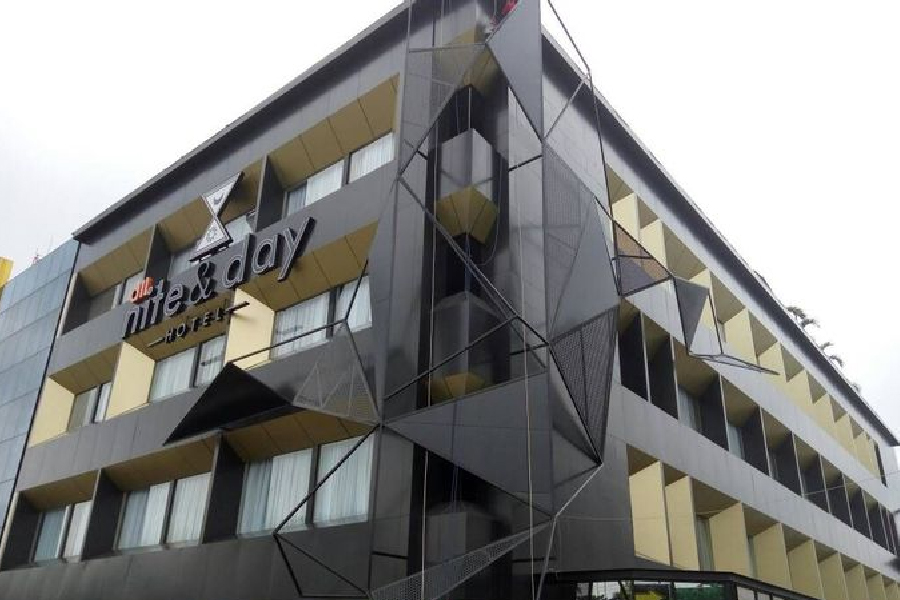 hotel building front view all nite & day palembang