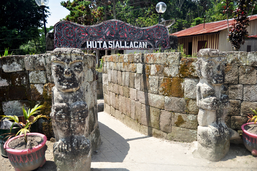 Ancient stone statue of Batu Kursi Raja Siallagan or Huta Stone Chair of King Siallagan for indonesian people and foreign traveler travel visit at Samosir on March 31, 2016 in North Sumatra, Indonesia